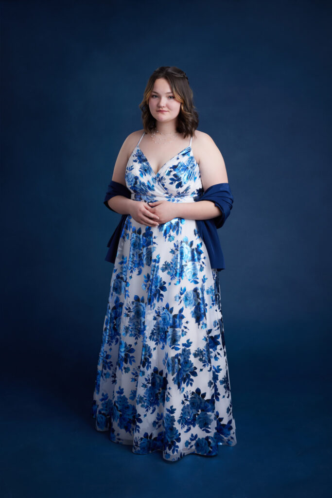 high school senior girl in a blue floral prom dresses in Pueblo CO
